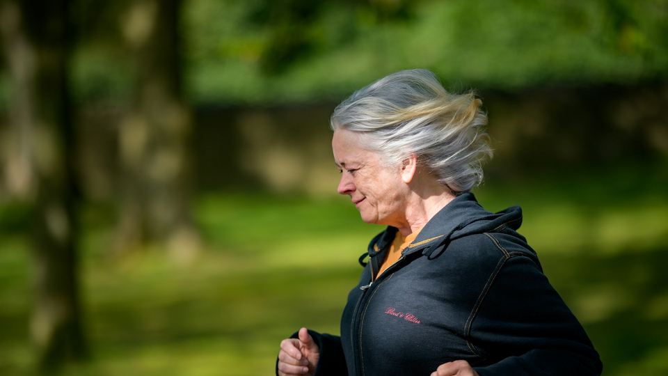A woman running in a park